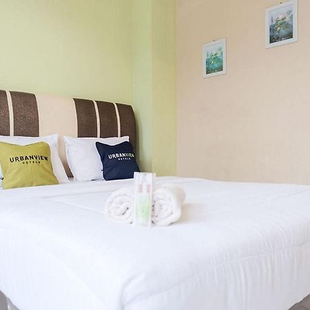 Urbanview Hotel Ta Ke Jelutung Puncak Jambi Exteriör bild