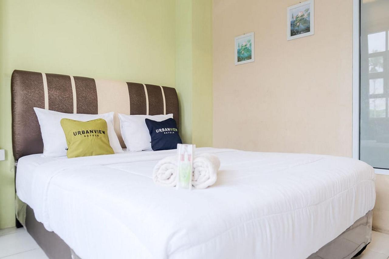 Urbanview Hotel Ta Ke Jelutung Puncak Jambi Exteriör bild