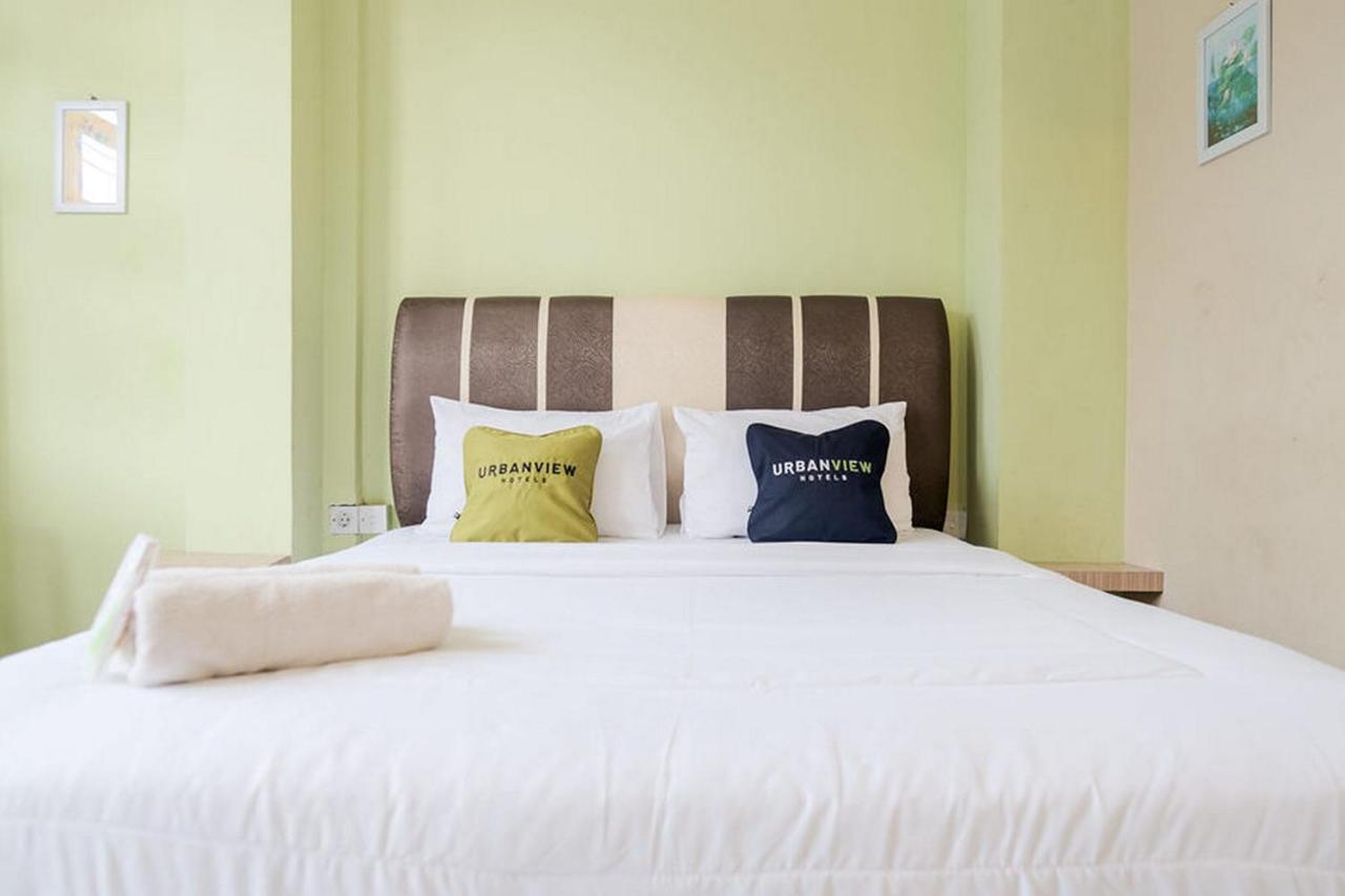 Urbanview Hotel Ta Ke Jelutung Puncak Jambi Exteriör bild