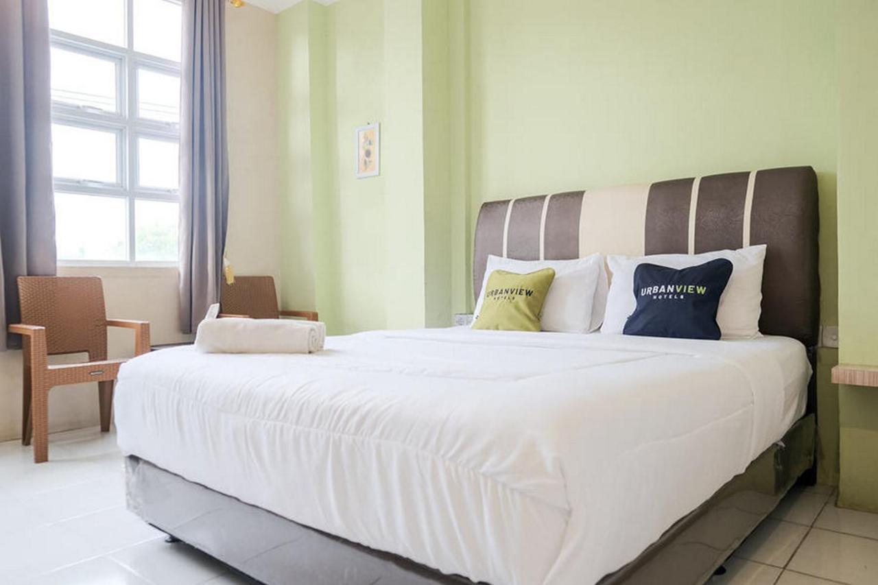 Urbanview Hotel Ta Ke Jelutung Puncak Jambi Exteriör bild