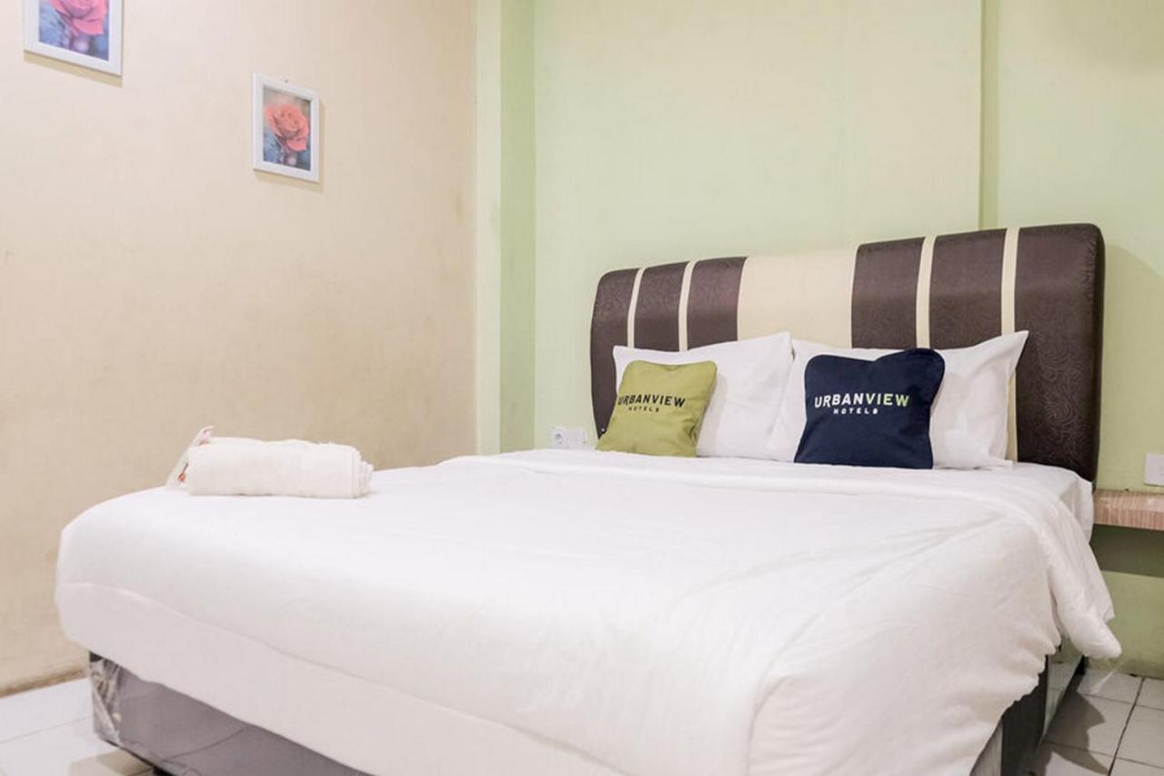 Urbanview Hotel Ta Ke Jelutung Puncak Jambi Exteriör bild